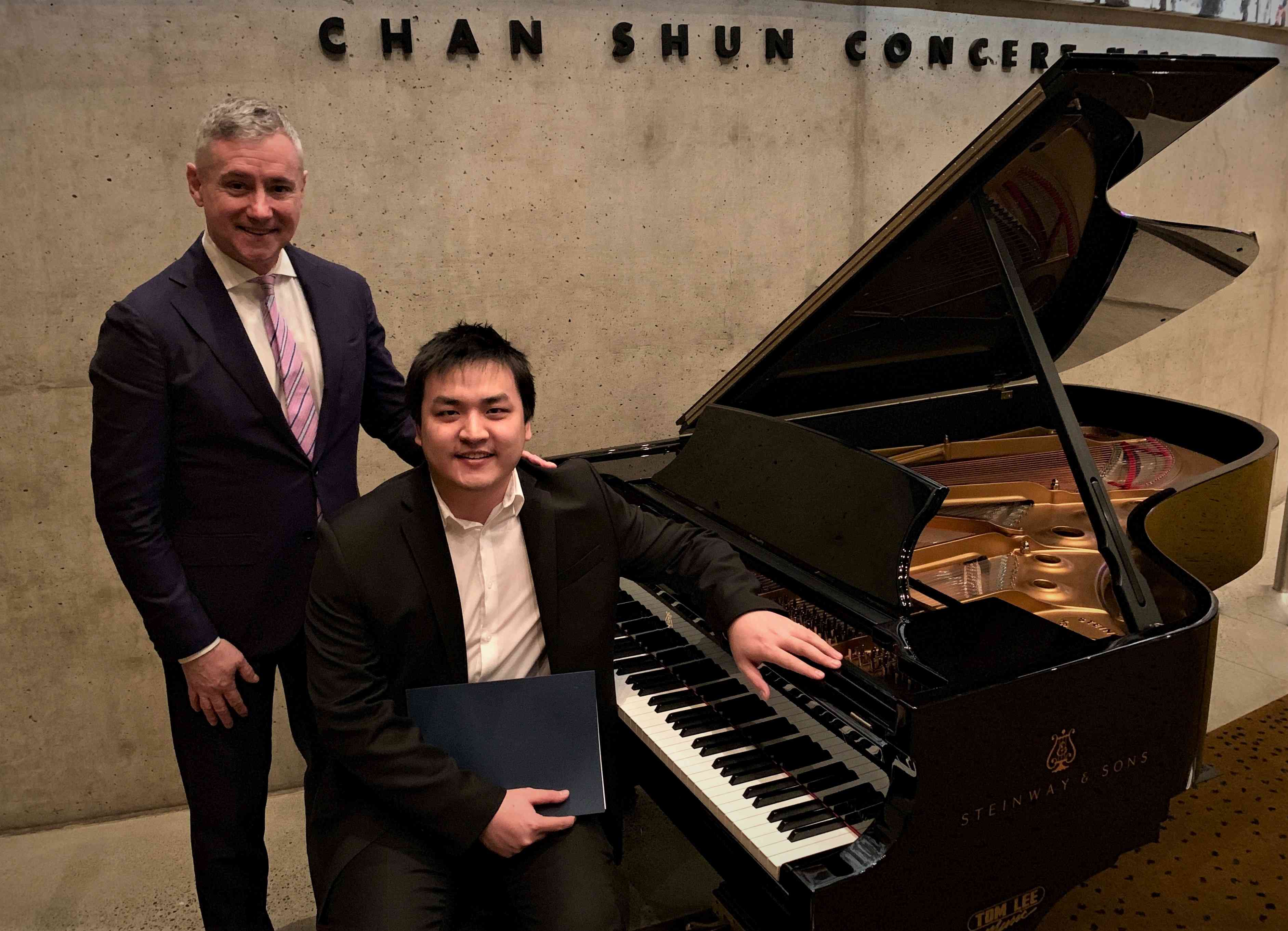 Richard he with Steinway & Sons CEO Ron Losby